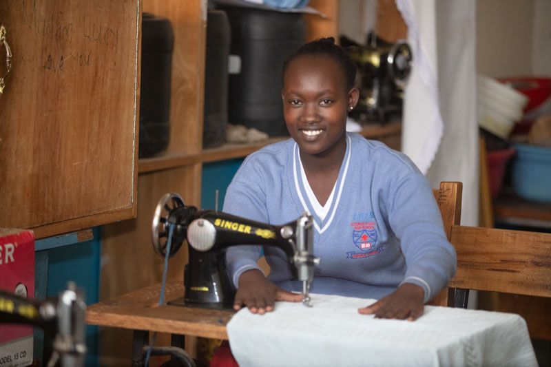 A student in the sewing lab - Kitengela Girls High School, Girls Schools in Kitengela
